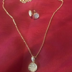 Gold necklace with crystal with matching earrings